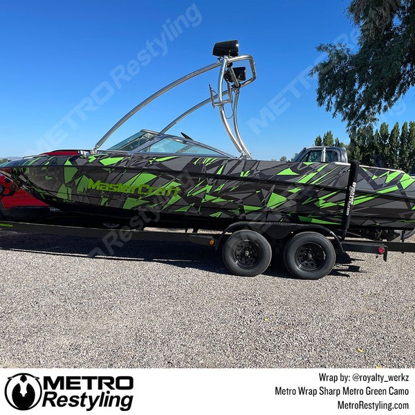 Boat wrapped in Metro Wrap Sharp Metro Green Camouflage Vinyl Film, demonstrating a rugged and protective application