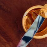 almond butter being spread on bread