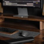 Gaming setup on a desk with PC, dual monitors, and peripherals