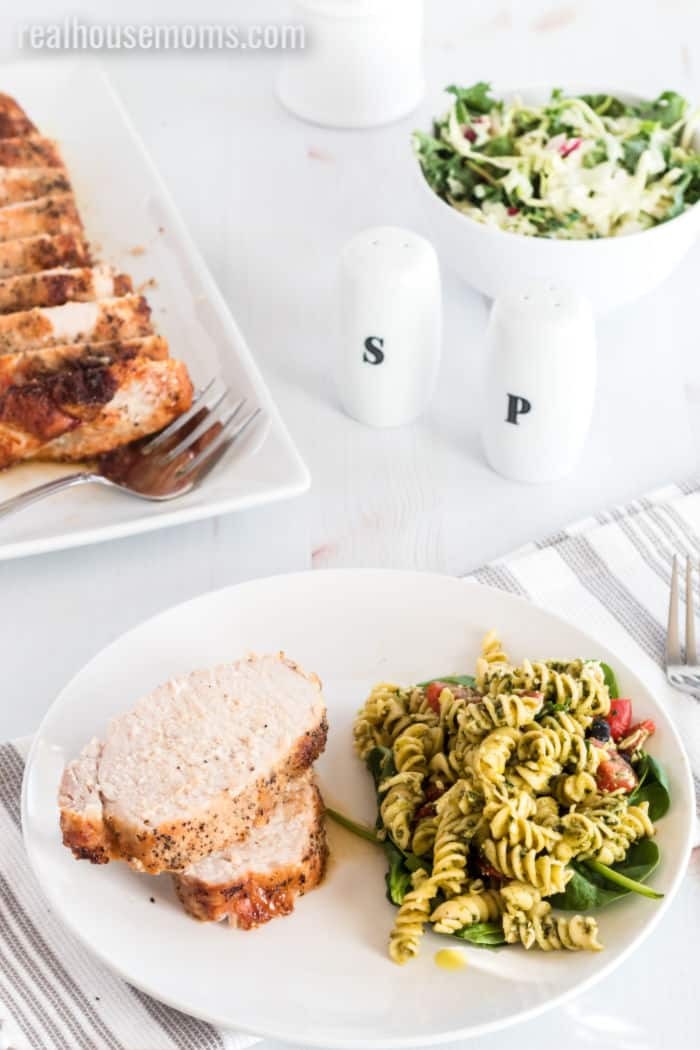 Roasted pork loin with vegetables, showcasing a complete and balanced meal