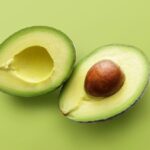 Close-up of the rich, creamy texture of avocado flesh, highlighting its natural green color