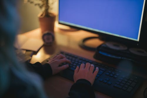 Man analyzing financial charts to manage currency exchange rates