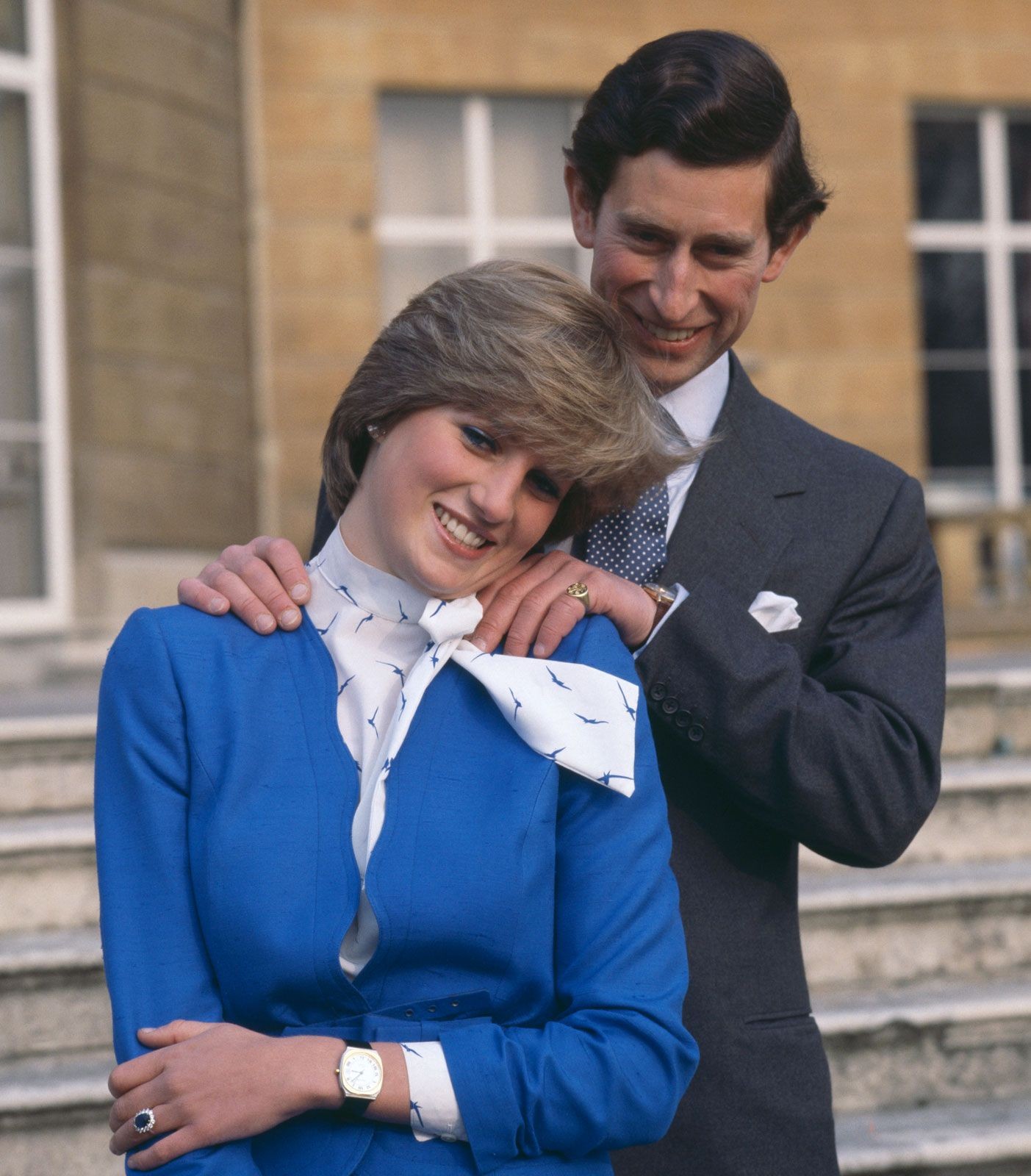 Charles III with his first wife, Lady Diana Spencer, outside Buckingham Palace after announcing their engagement, London, 1981