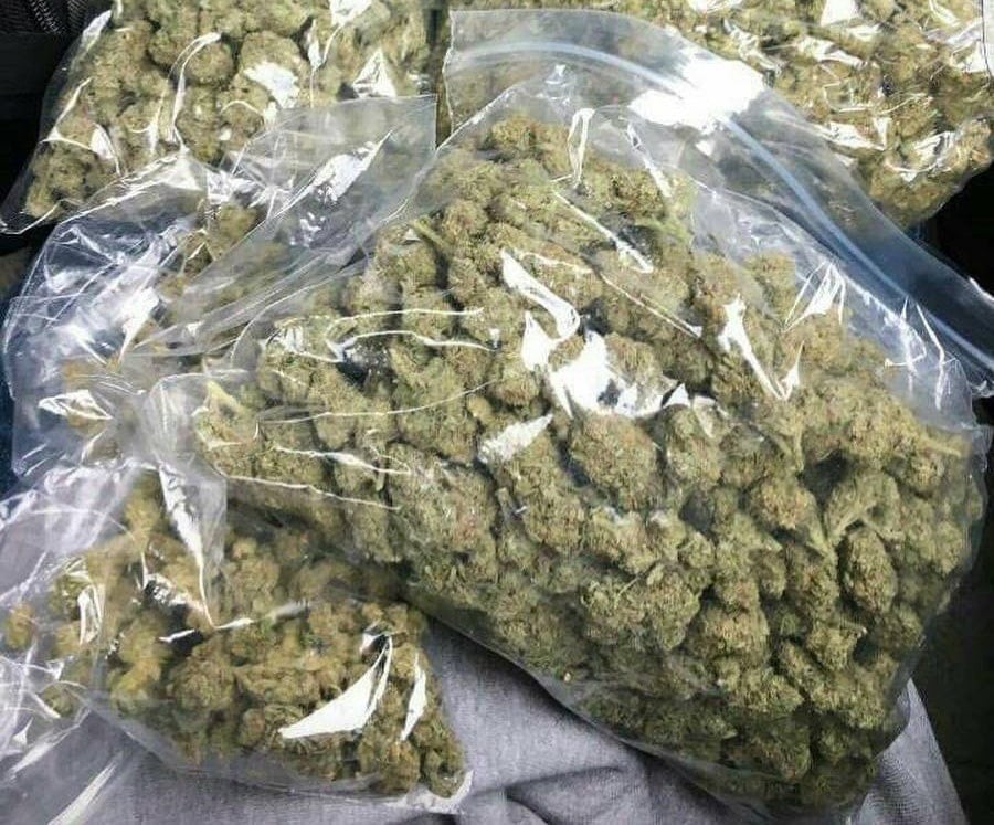 Quarter pound of marijuana showing a substantial amount of cannabis, typically four ounces.