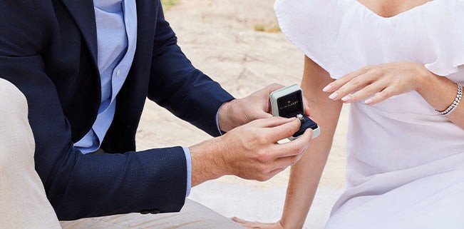 man about to put engagement ring
