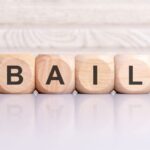 Wooden blocks spelling out "Bail Bond".