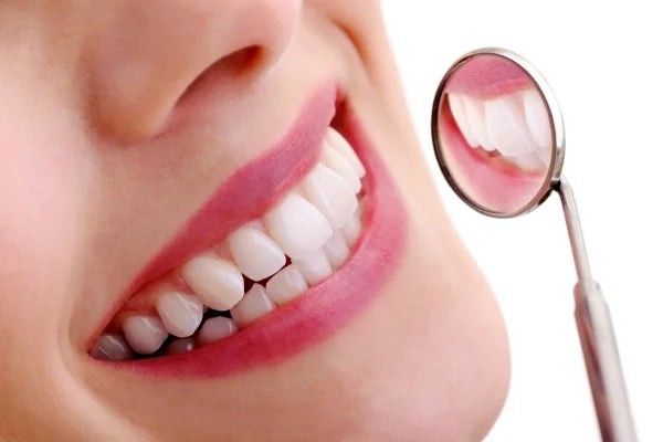 Smiling confidently after orthodontic treatment