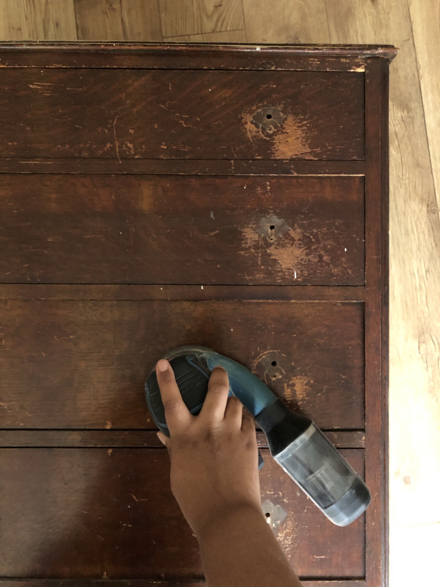 Before close up shot dated dresser sander