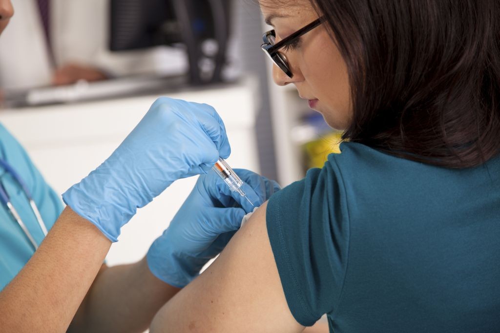 Tetanus shot administration by a healthcare professional
