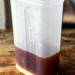 Thai iced tea being poured