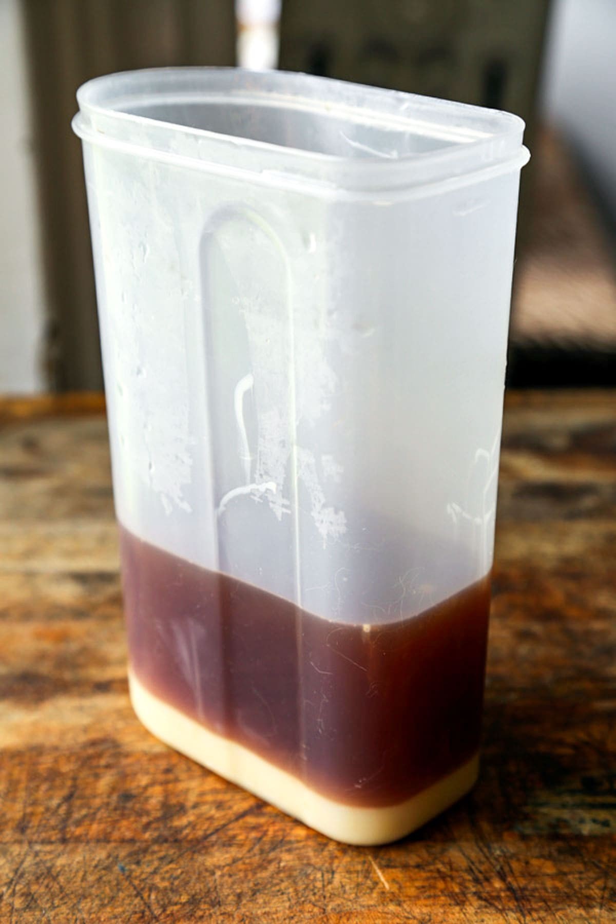 Thai iced tea being poured