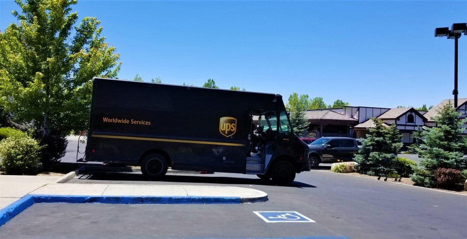 UPS truck delivering packages